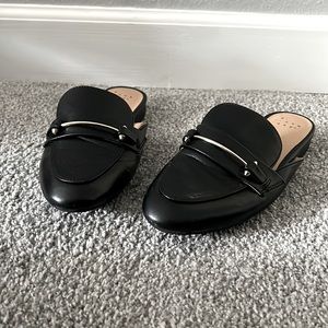 Black mules with silver detail